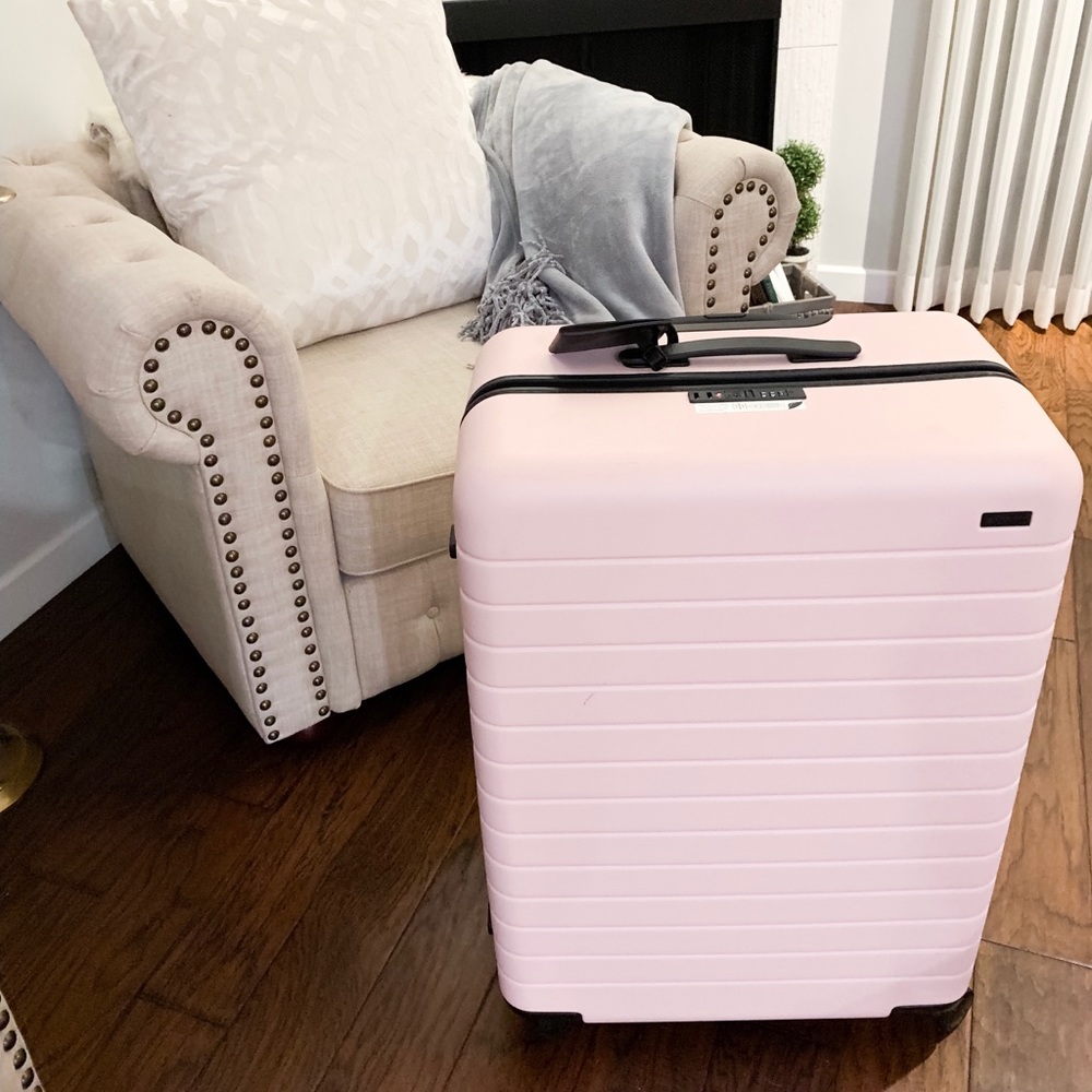 Never used AWAY suitcase in light pink!